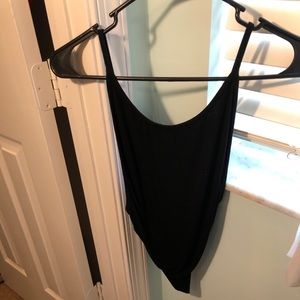 Black bodysuit- shows side boob